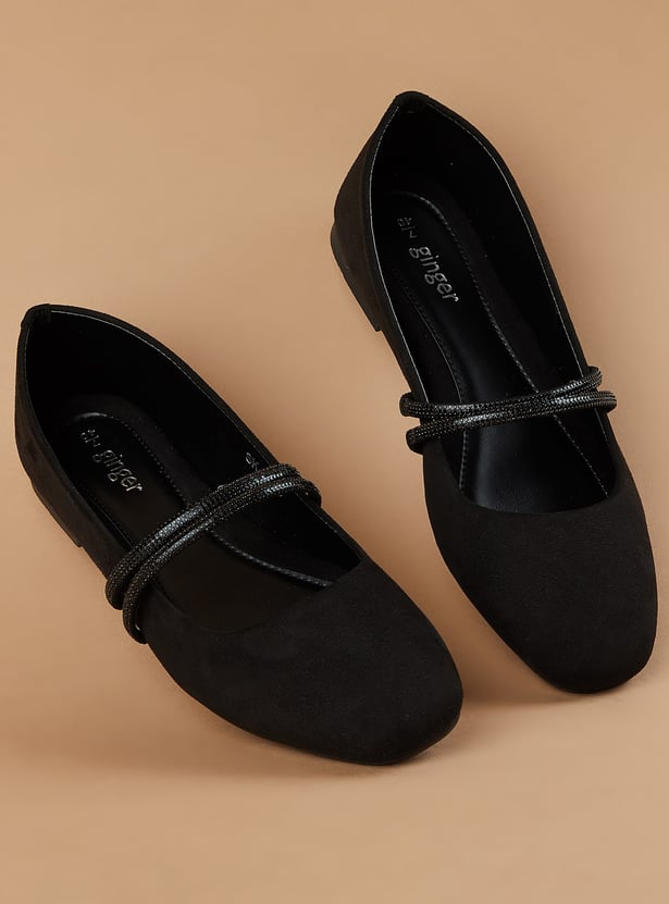 GINGER Embellished Ballerinas in elegant beige with sparkle details catching light, showcased on a soft rose background